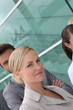Headshot smart happy workers outside office building