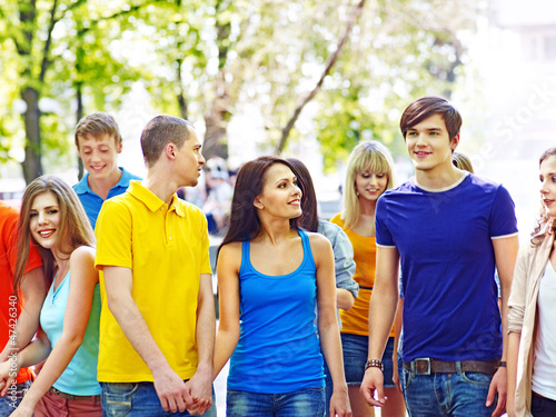Photo: Group people in summer outdoor. Group people in summer outdoor.