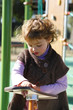 Young girl playing in a playground