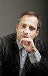 portrait of adult man isolated on dark background