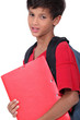 Schoolboy holding a folder