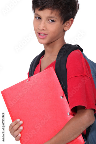 Photo: Schoolboy holding a folder Schoolboy holding a folder