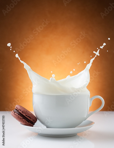 Photo: cup of milk splash with macaron cup of milk splash with macaron