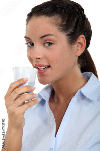 Photo: woman drinking coffee woman drinking coffee