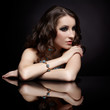brunette woman and mirror
