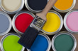 Tins of colorful paint