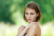 pensive beautiful young woman