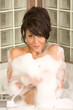 Attractive young gorges woman taking Bubble bath