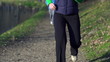 Tired woman catching breath during jogging, super slow motion