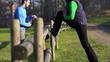 Couple exercising outdoors, crane shot, super slow motion