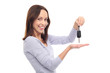 Young woman showing car key