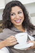 Happy Hispanic Woman Smiling Drinking Tea or Coffee