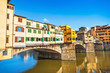 Ponte Vecchio with river Arno in Florence, Italy