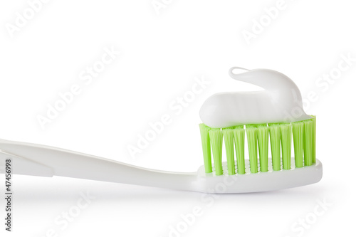 Photo: Toothpaste on the toothbrush. Closeup. Toothpaste on the toothbrush. Closeup.