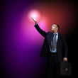 Businessman with light shining