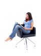 Casual 20s women sitting and reading in a magazine