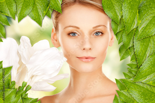 Photo: beautiful woman with madonna lily beautiful woman with madonna lily