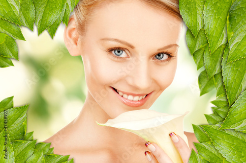Photo: beautiful woman with calla flower beautiful woman with calla flower