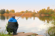 Photo: man fishing on the lake man fishing on the lake