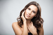 Portrait of beautiful woman, over grey