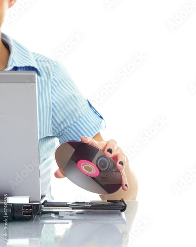 Photo: Woman hand with CD Woman hand with CD