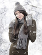Photo: Beautiful young brunette with winter clothes Beautiful young brunette with winter clothes