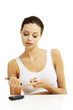 Diabetes patient measuring glucose level blood test