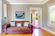 Leather sofa and living room with open door.