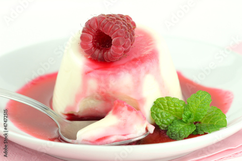 Photo: Panna cotta with raspberry coulis and fresh mint Panna cotta with raspberry coulis and fresh mint
