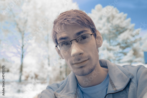 Photo: Young man in winter landscape Young man in winter landscape