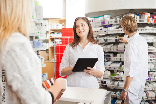 Photo: Pharmacist with Digital Tablet Pharmacist with Digital Tablet