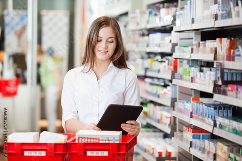 Photo: Pharmacist With Digital Tablet Pharmacist With Digital Tablet