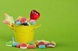 candies in yellow bucket