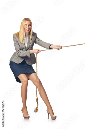 Photo: Businesswoman in tug of war concept Businesswoman in tug of war concept