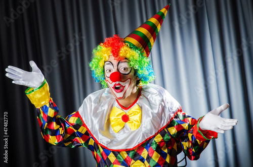 Photo: Funny clown in studio shooting Funny clown in studio shooting