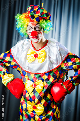 Photo: Funny clown in the studio shooting Funny clown in the studio shooting