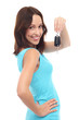 Smiling woman holding car key