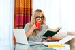 woman working on laptop at home