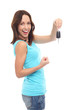 Smiling woman holding car key