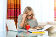 woman working on laptop at home