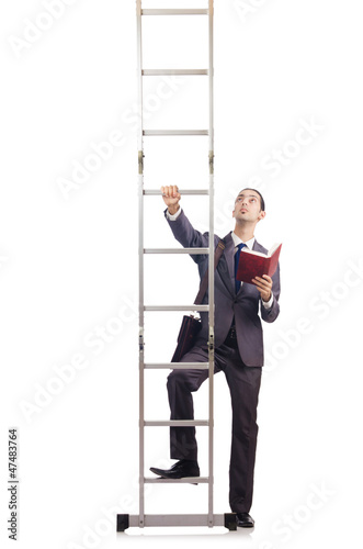 Photo: Businessman climbing the ladder isolated on white Businessman climbing the ladder isolated on white