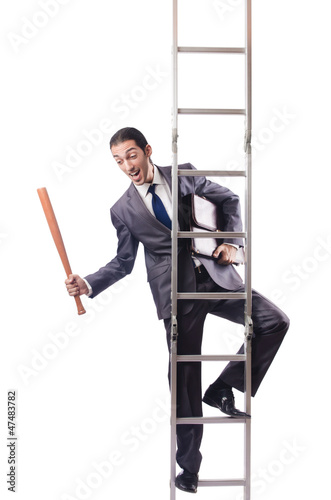 Photo: Businessman climbing the ladder isolated on white Businessman climbing the ladder isolated on white