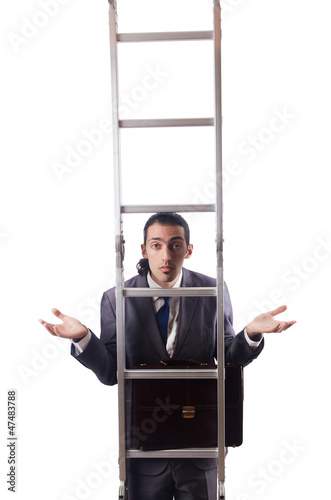 Photo: Businessman climbing the ladder isolated on white Businessman climbing the ladder isolated on white