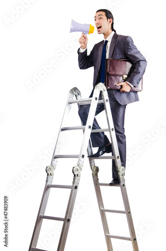 Photo: Businessman climbing career ladder on white Businessman climbing career ladder on white