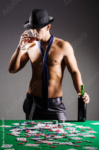 Photo: Naked broke businessman in casino Naked broke businessman in casino