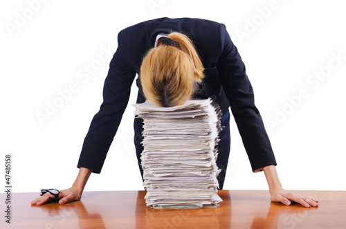 Photo: Woman businesswoman with lots of papers Woman businesswoman with lots of papers