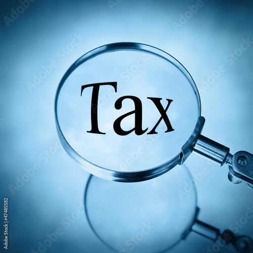 Photo: magnify tax magnify tax
