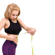 woman measuring her waist