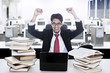 Happy businessman upon successful project