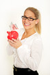 Frau mit Sparschwein